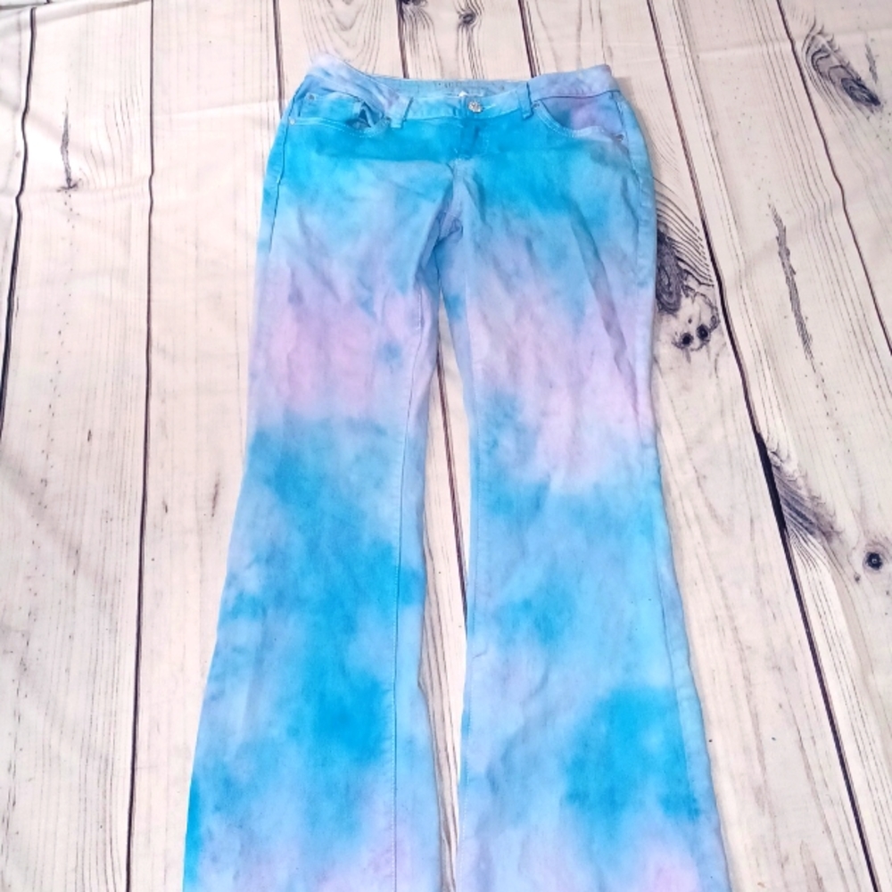 Repurposed tie dye jeans. Tie dye clothing. Size 8